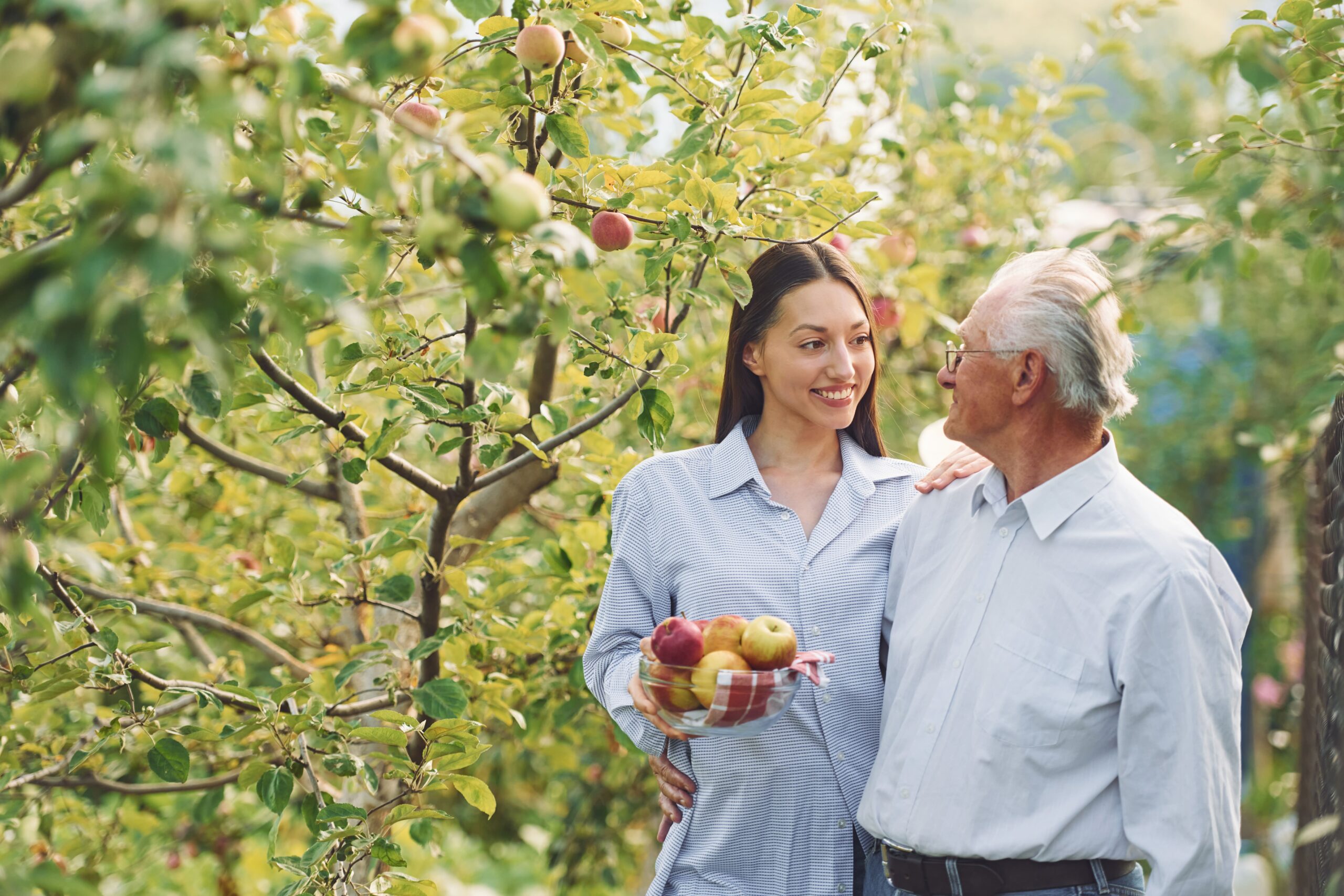 holding-fresh-apples-daughter-is-with-her-senior-2025-03-18-19-59-37-utc (1)